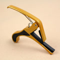 Miniatyrbillede 3 af 3: Guitar Capo til Akustiske og Klassiske Guitarer Guld