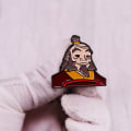 Pikkukuva 3 / 4: Avatar-hahmo Uncle Ailuo -solki, piirretty hahmo