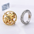 Miniatyrbild 2 av 5: Snurrande ring stressavlastande leksak silverguld 2 st snurrande ring