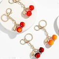 Miniatyrbillede 4 af 5: Unik Cherrys Love Lock Nøglering Charm Elegant Design Nøgleholder Tilbehør Bærbar til Moderne Personer Rød Red
