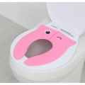 Pikkukuva 4 / 4: Vaaleanpunainen matkakäymäläistuin, taitettava, kannettava lasten wc-istuin