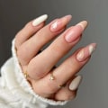 Pikkukuva 1 / 5: 24 kpl vaaleanoranssit sydämenmuotoiset lyhyet tekokynnet, stilettokärki, beige ranskalainen