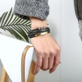 Miniatyrbillede 5 af 5: Flettet læderarmbånd i rustfrit stål