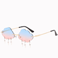 Miniatyrbillede 1 af 4: Et par kreative Cloud-formede solbriller til kvinder