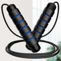 This speed jump rope has ball bearings, adjustable length, and an ergonomic foam handle, making it...