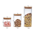 Miniatyrbilde 2 av 2: Klar glasskrukke med tettende lokk for oppbevaring av mat, med trelokk for løs te, kaffebønner, sukker, salt