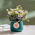 Miniatyrbillede 1 af 5: Simulerede grønne planter hjem indendørs Nordisk stil lille tusindfryd simulation blomst keramisk potteplante (lilla blomst blå potte)