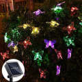 Miniatyrbild 1 av 5: Solar String Lights,T-Audace 5 Meter Solar LED String Lights 20 Butterfly Christmas Party Decoration Lighting (RGB) [Energiklass A+++] (Färg），