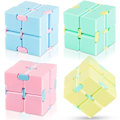 Miniatyrbillede 1 af 3: Rubiks terning (gul, grøn, pink og blå) sæt med fire