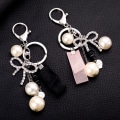 Miniatyrbillede 4 af 5: Ruban Bow Porte-clés Perle Porte-clés Sac Femme Accessoires Pende