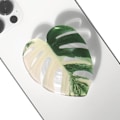 Miniatyrbild 1 av 4: Söt Akryl Tropiskt Blad Design Hopfällbar Expanderbar Mobiltelefon Grepp Ställ Hållare för Smartphone Tablet Mobiltelefon Tillbehör