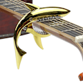 Miniatyrbild 1 av 5: Shark-formad stämningsklämma för gitarr, stämningsklämma i zinklegering, lämplig för akustisk, elektrisk klassisk gitarr och bas ukulele stämningsklämma, guld färg