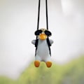 Pikkukuva 1 / 6: Keinutuva Ankka Auton Ripustuskoriste Söpö Anime Tarvikkeet Ripustus Auton Sisustukseen Auton Taustapeilin Ripustin Autokoriste Tarvikkeet Bm Duck