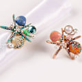 Miniatyrbillede 4 af 5: 4 stk. søstjerne servietringe, perle rhinestone ocean kystnære nautiske servietringholdere servietspænde（blå）