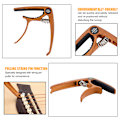 Miniatyrbild 5 av 8: Mångsidig Gitarrkapo, Snabb Förflyttning & Kompatibilitet för Sömlöst Spelande, Högkvalitativt Material Säkerställer Inget Bandrassel, Ergonomiskt Designad för