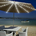 Miniatyrbillede 1 af 5: Solcelle-Parasol-Lysstreng - 104 LED'er - 8 Tilstande - IP67 - Vandafvisende - Perfekt Til Fest, Jul, Halloween, Camping (Positivt Hvidt Lys)