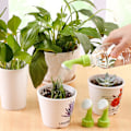 Miniatyrbillede 2 af 5: Flaskevander Havevander PVC-vander Plante Plastikflaske Vandingsudstyr 2 stk.