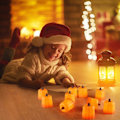 Pikkukuva 4 / 4: LED Kurpitsa Tuikkukynttilät, Oranssit Korkeat Valot (12 kpl, Oranssi)