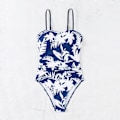 Miniatyrbild 1 av 2: 2024 Ny Ankomst Modeexport En-Delad Baddräkt Dam Spaghettiband Slank Vacker Ryggtryck Allt-i-Ett Baddräkt Amazon Blue background with white flowers M