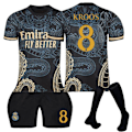 Miniatyrbillede 1 af 2: 23-24 Real Madrid Dragon Black Special Edition Fodboldtrøjer Børns fodboldsæt No.8 Kroos 18