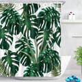 Duschdraperi med gröna blad Monstera tropisk växt