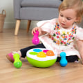 Miniatyrbillede 4 af 5: Fat Brain Spinny Pins Baby tumlende pinde, til opbevaring, berøring og