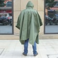 Miniatyrbillede 4 af 5: En militærgrøn udendørs bjergbestigning én-delt regnfrakke