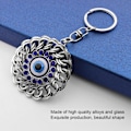 Miniatyrbillede 8 af 8: 2 stk. Ondt Øje Nøglering Openwork Rundt Snoet Diamant Tyrkiet Blå Ondt Øje Amulet Nøglering Taske Charm Dekor