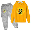 Miniatyrbild 1 av 5: Vår Höst Pojkar Casual Cobra Kai Tryck Långärmad Tröja Hoodie+Byxor Kläder 2ST Träningsdräkt 4-14 År Flickor Pojkar Kläder-Perfet 4T 11