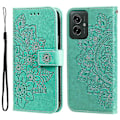 Miniatyrbillede 1 af 4: Syv-bladet Blomster Præget Læder Telefon Cover - Perfet Compatible with MotorolaMoto G55