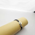 Miniatyrbild 2 av 3: Silver Handbojor Armband På Snöre - Perfekt