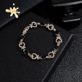 Miniatyrbild 1 av 5: Fashionabla Metal Love Heart Hollow Inlagt hjärta armband Black
