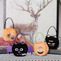 Pikkukuva 3 / 5: Halloween-karkkipussit kahvoilla, karkkien säilytysämpäri, Halloween-karkkipussit, kantokassi lastenjuhliin