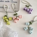 Miniatyrbilde 2 av 8: 1 Stk Flower Knitted Keychain Nøkkelring Dame Heklet Ullblomst White