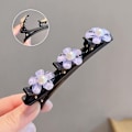 Pikkukuva 1 / 8: Flower Sparkling Crystal Butterfly punottu hiusklipsit Nelilehtinen 1