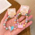 Miniatyrbilde 4 av 5: Cartoon Barnearmbånd Jelly Color Beaded Armbånd e Brace A6