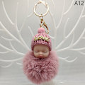 Pikkukuva 1 / 5: Sleeping Baby Avaimenperä ja Fluffy Pehmo Doll Avaimenperät Naisten Tytöt A12
