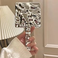Pikkukuva 1 / 8: Ins Liquid Shape Square Mirror Mini Handheld Desktop Cosmetic