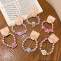 Miniatyrbilde 2 av 5: Cartoon Barnearmbånd Jelly Color Beaded Armbånd e Brace A6