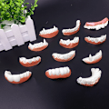 Miniatyrbilde 3 av 8: 12 stk Morsomme Gebissmodell Cosplay Rekvisitter Gebissleker Spoof Til 12pcs