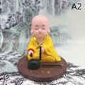 Miniatyrbillede 1 af 5: Solar Powered Bobble Rystende Hoved Dansende Legetøj Buddhist Monk Dol yellow