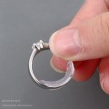 Miniatyrbilde 3 av 7: 8 størrelser Invisible Clear Ring Size Adjuster Resizer Løs ring R