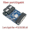 Miniatyrbild 4 av 5: Gigabit Ethernet Switch Fiber Optisk Media Konverterare 4 RJ45 2 10/100/1000M UTP 2F4E Port PCB