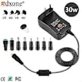 Miniatyrbild 1 av 5: Universell AC-adapter 3V 4.5V 5V 6V 7.5V 9V 12V 2A 2.5A DC Strömförsörjningstransformator med 8 adaptrar för LED-hushållselektronik.