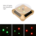 Miniatyrbild 8 av 8: Solcellsdriven LED Elektrisk Roterande Turntable Displayställ för Smycken Telefon Guld med Ljus