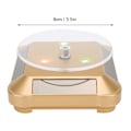 Miniatyrbild 7 av 8: Solcellsdriven LED Elektrisk Roterande Turntable Displayställ för Smycken Telefon Guld med Ljus