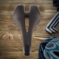 Miniatyrbillede 2 af 8: Carbon PU læder cykelsadel til bjergvejscykling Udhulet sædepude