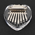 Miniatyrbillede 8 af 8: Tommelfingerklaver 8 tangenter Mini bærbart akrylmateriale Dekorationsgave Musikinstrument (hjerteformet krystal)