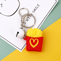 Miniatyrbillede 3 af 5: Nøglering i form af figurer, der passer perfekt sammen i gummi Multifarvet V