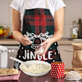 Miniatyrbillede 2 af 4: Juleforklæde Rød Køkkenforklæde Glædelig Jul Jingle Bells Mønstre Klassisk Ternet Stil Sort Beskyt Din C J